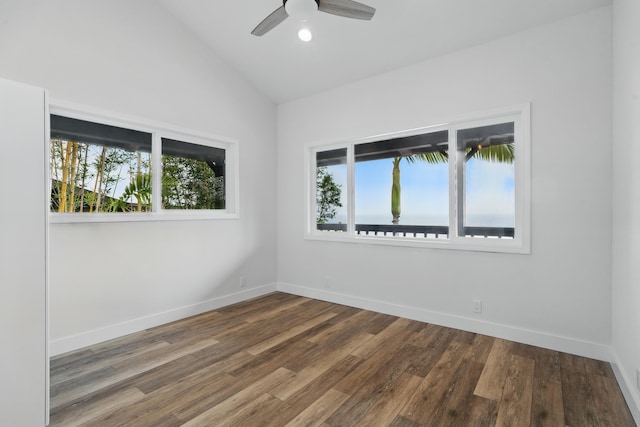 77-6452 Leilani St, Kailua-Kona, HI 96740 - empty room with plenty of natural light, wood finished floors, vaulted ceiling, and ceiling fan