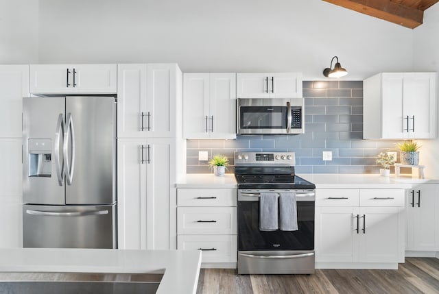77-6452 Leilani St, Kailua-Kona, HI 96740 - kitchen with stainless steel appliances, light countertops, white cabinetry, decorative backsplash, and beamed ceiling