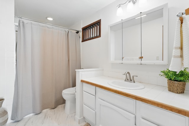 77-6452 Leilani St, Kailua-Kona, HI 96740 - full bathroom featuring vanity, curtained shower, and marble look tile flooring