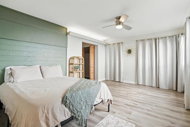 77-6452 Leilani St, Kailua-Kona, HI 96740 - bedroom featuring wood finished floors and a ceiling fan