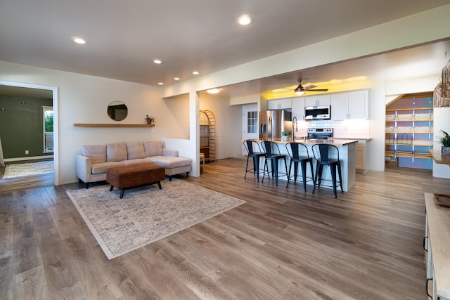 77-6452 Leilani St, Kailua-Kona, HI 96740 - living area with recessed lighting, wood finished floors, and ceiling fan