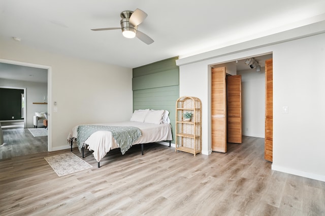 77-6452 Leilani St, Kailua-Kona, HI 96740 - bedroom featuring light wood-style flooring and ceiling fan