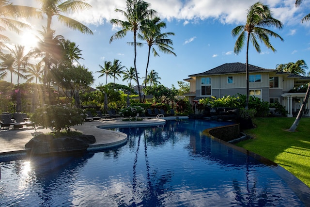 69-200 Pohakulana Pl Unit H22, Waikoloa, HI 96738 - swimming pool with a patio and a lawn
