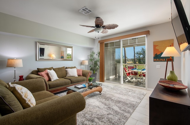 69-200 Pohakulana Pl Unit H22, Waikoloa, HI 96738 - living room featuring healthy amount of natural light, a ceiling fan, and light tile patterned floors