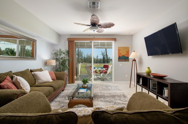 69-200 Pohakulana Pl Unit H22, Waikoloa, HI 96738 - living room with a ceiling fan and baseboards