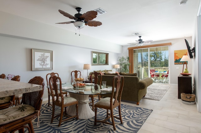 69-200 Pohakulana Pl Unit H22, Waikoloa, HI 96738 - dining area with a ceiling fan