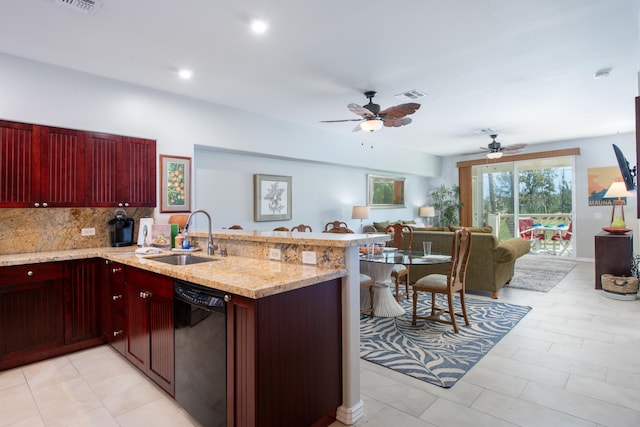 69-200 Pohakulana Pl Unit H22, Waikoloa, HI 96738 - kitchen featuring black dishwasher, reddish brown cabinets, a peninsula, decorative backsplash, and open floor plan