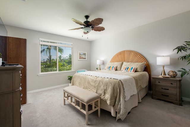 69-200 Pohakulana Pl Unit H22, Waikoloa, HI 96738 - bedroom with light colored carpet and ceiling fan