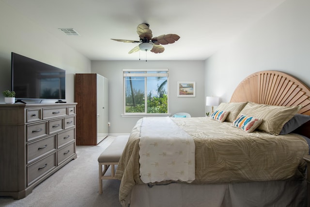 69-200 Pohakulana Pl Unit H22, Waikoloa, HI 96738 - bedroom with light carpet and ceiling fan