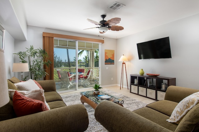 69-200 Pohakulana Pl Unit H22, Waikoloa, HI 96738 - living room featuring baseboards and a ceiling fan