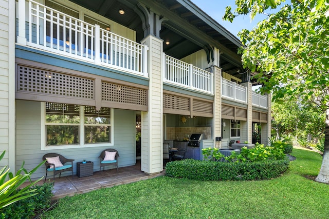 68-1118 N Kaniku Dr Unit 2404, Kamuela, HI 96743 - rear view of property with a lawn