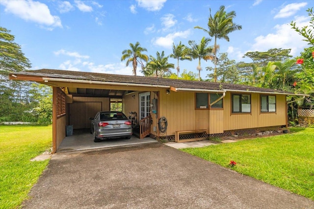15-2775 Manalo St, Pahoa, HI 96778 - ranch-style house featuring asphalt driveway, a carport, and a front lawn