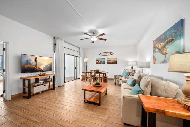 75-6040 Alii Dr Unit 714, Kailua-Kona, HI 96740 - living area featuring a ceiling fan and light wood-type flooring