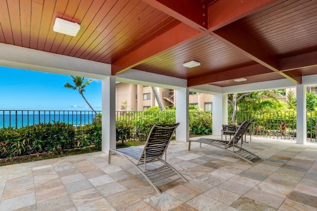 75-6040 Alii Dr Unit 714, Kailua-Kona, HI 96740 - view of patio / terrace featuring a water view