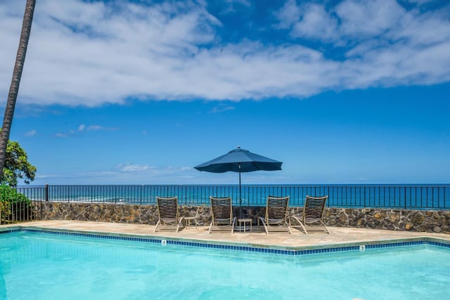 75-6040 Alii Dr Unit 714, Kailua-Kona, HI 96740 - community pool with a water view and a patio area