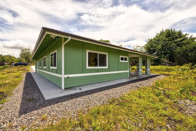 16-1653 34th Ave, Keaau, HI 96760 - view of side of property featuring a patio area