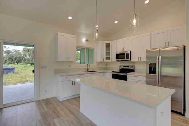 16-1653 34th Ave, Keaau, HI 96760 - kitchen with stainless steel appliances, white cabinetry, recessed lighting, a center island, and hanging light fixtures