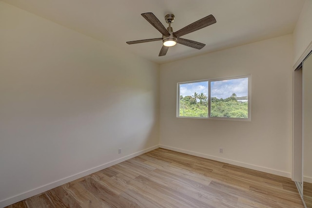 16-1653 34th Ave, Keaau, HI 96760 - unfurnished bedroom with light wood finished floors, a closet, and a ceiling fan