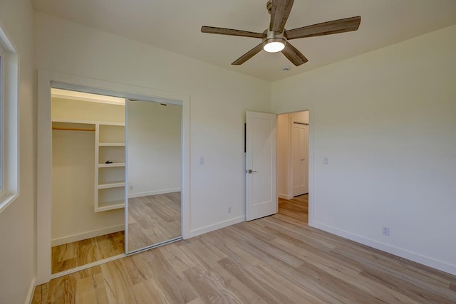 16-1653 34th Ave, Keaau, HI 96760 - unfurnished bedroom with light wood finished floors, ceiling fan, and a closet