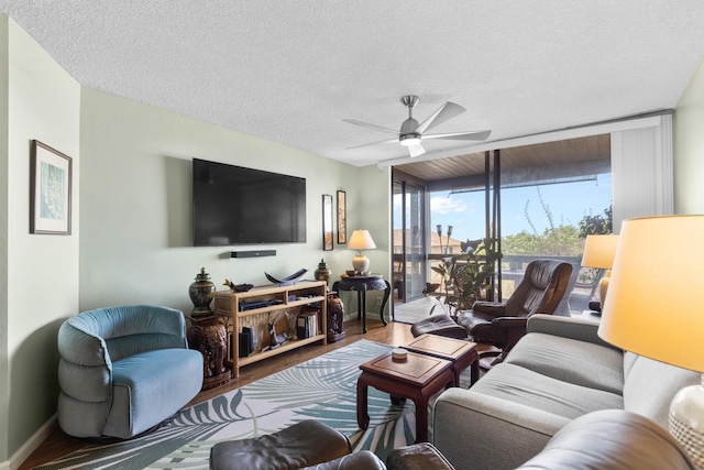 77-301 Noelani Way Unit 12, Kailua-Kona, HI 96740 - living area with wood finished floors, a ceiling fan, and a textured ceiling