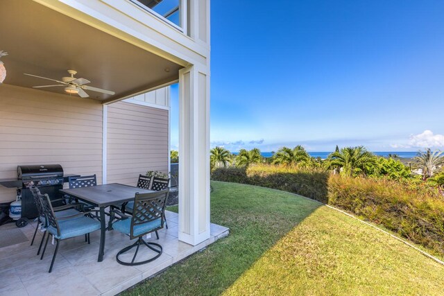 78-6833 Alii Dr Unit C5, Kailua-Kona, HI 96740 - view of patio with a ceiling fan, grilling area, outdoor dining area, and a water view