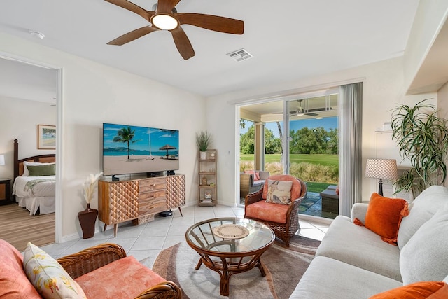 69-200 Pohakulana Pl Unit E2, Waikoloa, HI 96738 - living room with a ceiling fan and light tile patterned floors