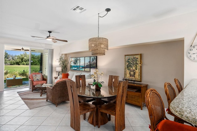 69-200 Pohakulana Pl Unit E2, Waikoloa, HI 96738 - dining space featuring light tile patterned floors, a ceiling fan, and a chandelier