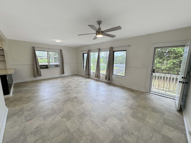 17-312 Volcano Rd, Kurtistown, HI 96760 - unfurnished living room with ceiling fan and stone finish flooring