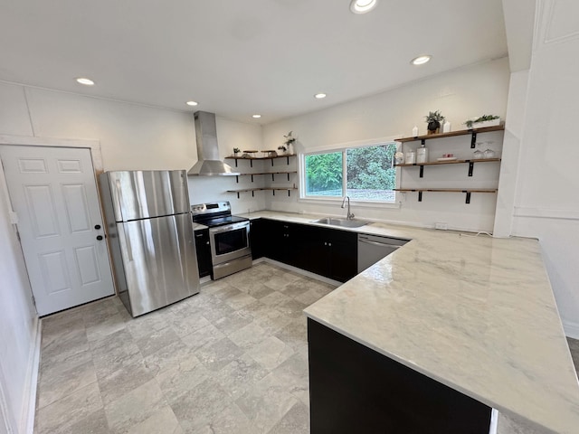 17-312 Volcano Rd, Kurtistown, HI 96760 - kitchen featuring appliances with stainless steel finishes, open shelves, wall chimney range hood, dark cabinets, and a peninsula