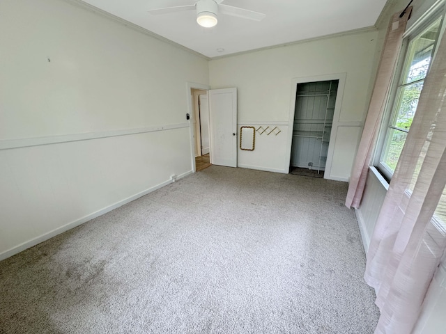 17-312 Volcano Rd, Kurtistown, HI 96760 - unfurnished bedroom with ornamental molding, carpet, a closet, and ceiling fan