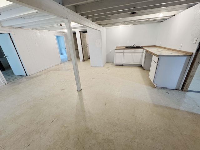 17-312 Volcano Rd, Kurtistown, HI 96760 - below grade area featuring a sink and light floors