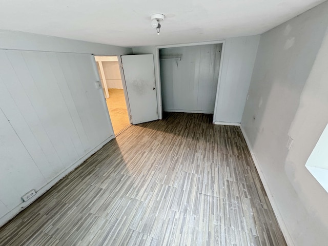 17-312 Volcano Rd, Kurtistown, HI 96760 - unfurnished bedroom featuring wood finished floors and a closet