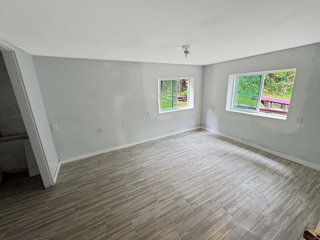 17-312 Volcano Rd, Kurtistown, HI 96760 - unfurnished room with wood finished floors and baseboards