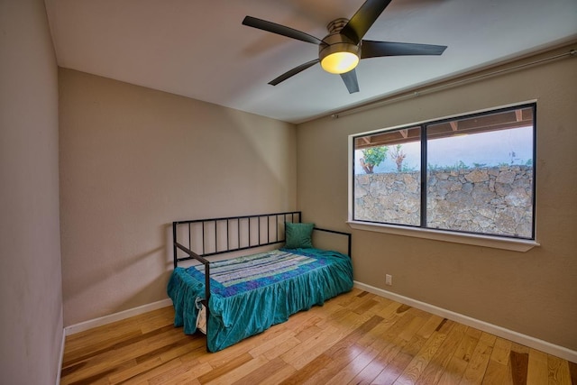 68-1768 Niu Haohao Pl, Waikoloa, HI 96738 - bedroom featuring wood finished floors and a ceiling fan