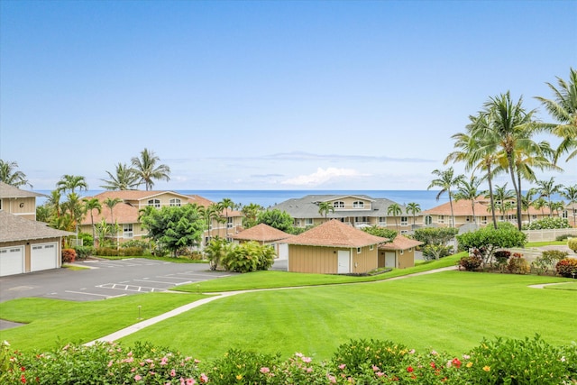 75-6060 Kuakini Hwy Unit E4, Kailua-Kona, HI 96740 - view of grassy yard with a water view and a residential view