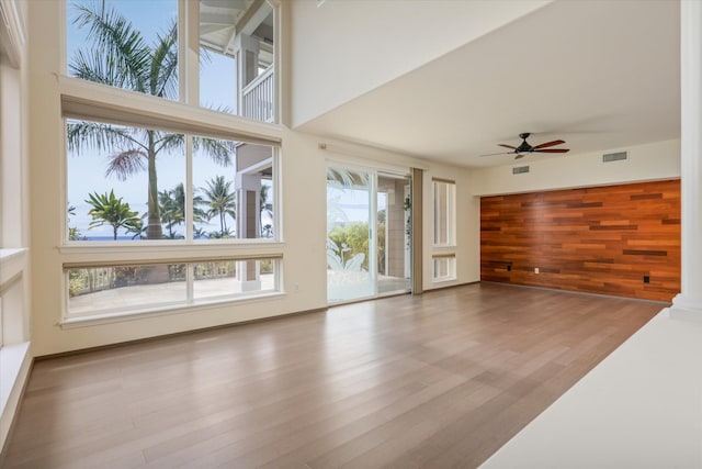 75-6060 Kuakini Hwy Unit E4, Kailua-Kona, HI 96740 - unfurnished living room featuring ceiling fan and wood finished floors