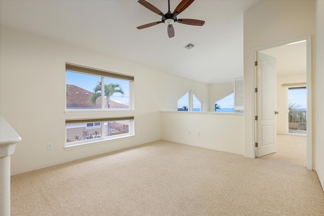 75-6060 Kuakini Hwy Unit E4, Kailua-Kona, HI 96740 - carpeted empty room with ceiling fan and vaulted ceiling