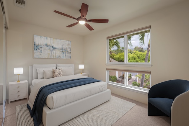 75-6060 Kuakini Hwy Unit E4, Kailua-Kona, HI 96740 - bedroom featuring carpet flooring and a ceiling fan