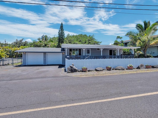 15-974 Paradise Ala Kai Dr, Keaau, HI 96749 - ranch-style house featuring a garage, covered porch, and driveway