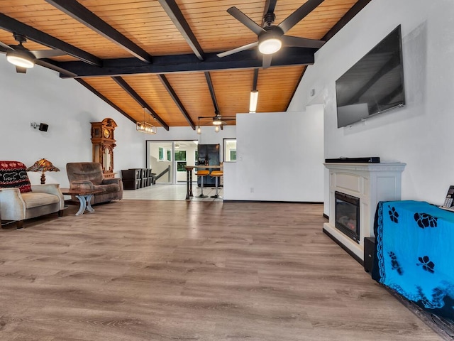 15-974 Paradise Ala Kai Dr, Keaau, HI 96749 - living area with a ceiling fan, wood ceiling, wood finished floors, and a glass covered fireplace
