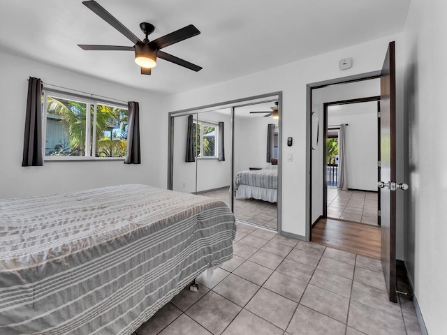 15-974 Paradise Ala Kai Dr, Keaau, HI 96749 - bedroom featuring light tile patterned floors, a closet, and ceiling fan