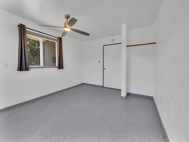 15-974 Paradise Ala Kai Dr, Keaau, HI 96749 - unfurnished bedroom with ceiling fan and speckle patterned floor
