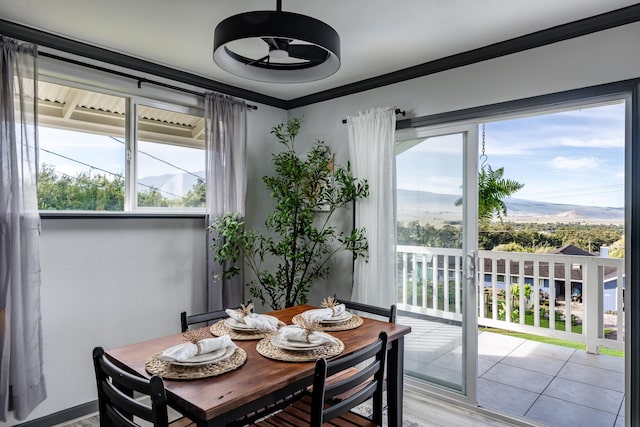 64-5246 Puu Nani Dr, Kamuela, HI 96743 - dining area with healthy amount of natural light, a mountain view, and crown molding