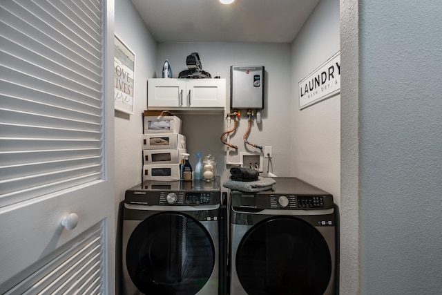 64-5246 Puu Nani Dr, Kamuela, HI 96743 - laundry area with cabinet space, washer and dryer, and tankless water heater