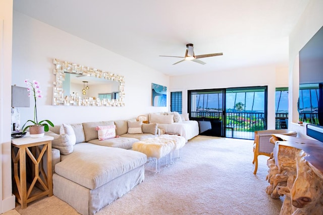 1565 Pee Rd Unit 122, Koloa, HI 96756 - carpeted living room with a ceiling fan