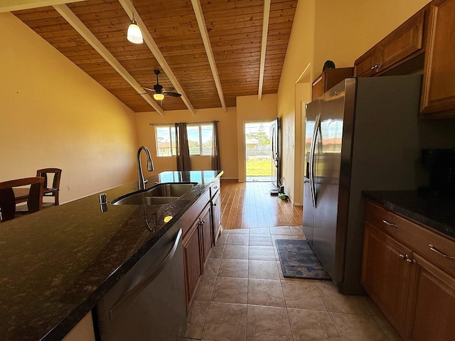 16-2110 Pearl Dr, Pahoa, HI 96778 - kitchen featuring wooden ceiling, stainless steel appliances, ceiling fan, light tile patterned flooring, and dark stone counters