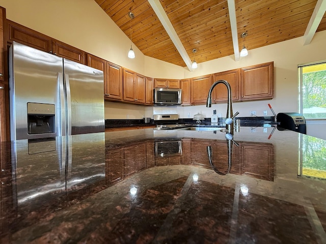 16-2110 Pearl Dr, Pahoa, HI 96778 - kitchen with stainless steel appliances, brown cabinets, dark stone countertops, wooden ceiling, and pendant lighting