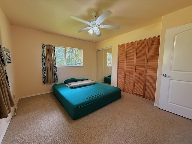 16-2110 Pearl Dr, Pahoa, HI 96778 - bedroom with multiple closets, carpet floors, and a ceiling fan