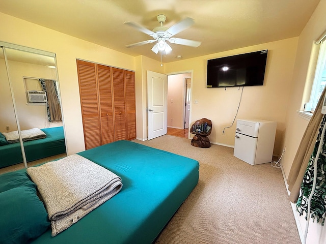 16-2110 Pearl Dr, Pahoa, HI 96778 - bedroom with freestanding refrigerator, carpet floors, a ceiling fan, and multiple closets