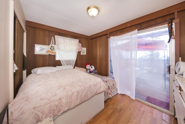 73-4216 Kiekie St, Kailua-Kona, HI 96740 - bedroom featuring wood finished floors and wood walls